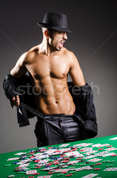 Naked broke businessman in casino Stock photo © Elnur