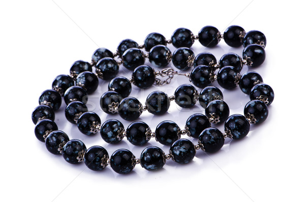 Dark pearl necklace isolated on the white Stock photo © Elnur