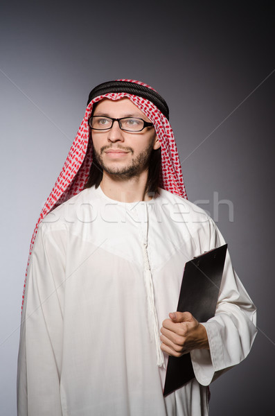 Arab man with paper binder Stock photo © Elnur