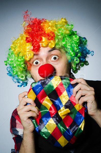 Funny clown against the dark background Stock photo © Elnur