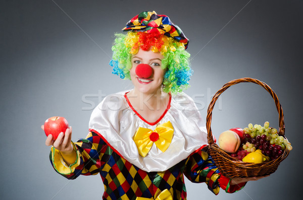 Clown with fruits in funny concept Stock photo © Elnur