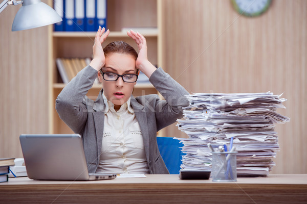 Busy stressful woman secretary under stress in the office Stock photo © Elnur