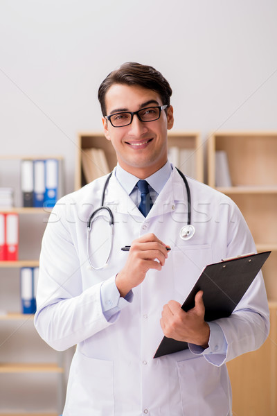 Young adult doctor working in the hospital Stock photo © Elnur