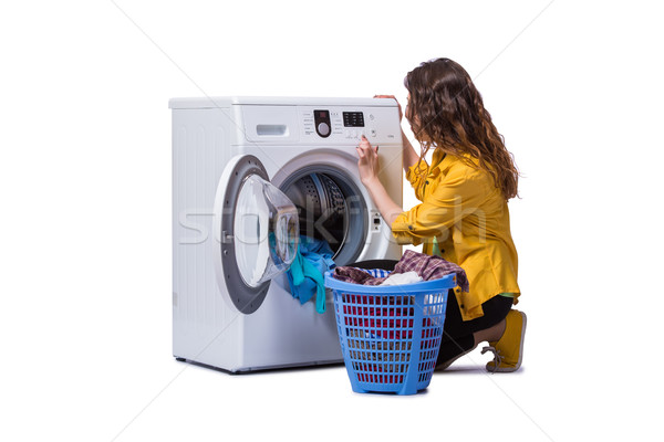 Woman tired after doing laundry isolated on white Stock photo © Elnur