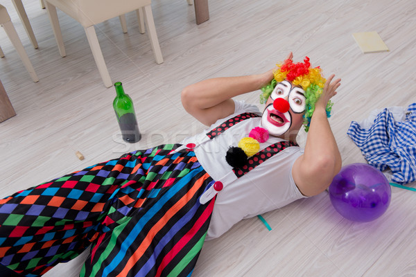 Drunk clown celebrating having a party at home Stock photo © Elnur