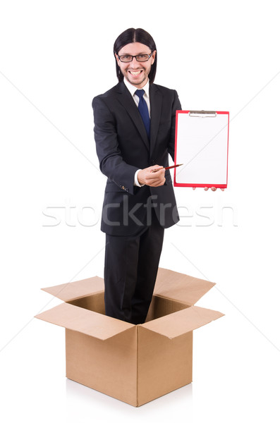 Young businessman in thinking out of box concept Stock photo © Elnur