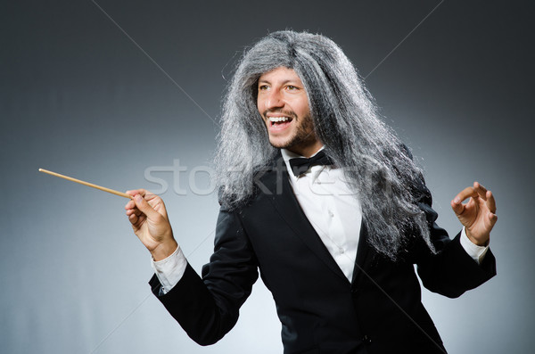 Funny conductor with long grey hair Stock photo © Elnur