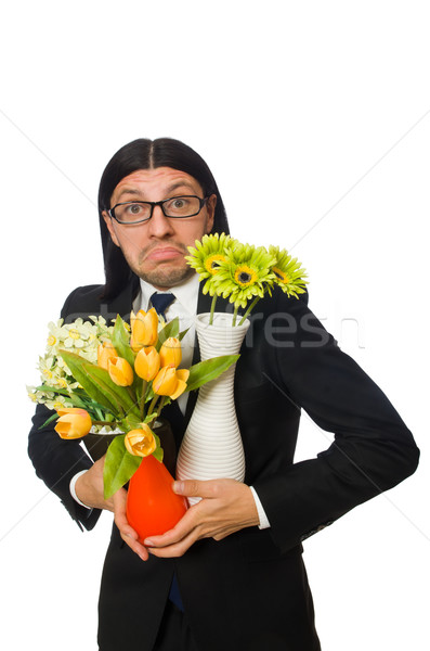 Handsome businessman with flower pot isolated on white Stock photo © Elnur
