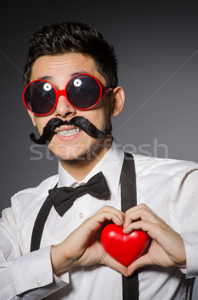 Junger Mann falsch Schnurrbart isoliert grau Liebe Stock foto © Elnur