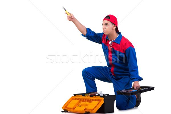 Young repairman with wrench spanner isolated on white Stock photo © Elnur