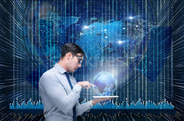 Businessman in futuristic computing concept Stock photo © Elnur