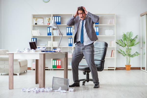 Angry businessman shocked working in the office fired sacked Stock photo © Elnur