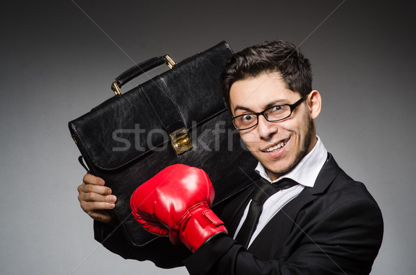 Businessman with boxing gloves in sport concept Stock photo © Elnur