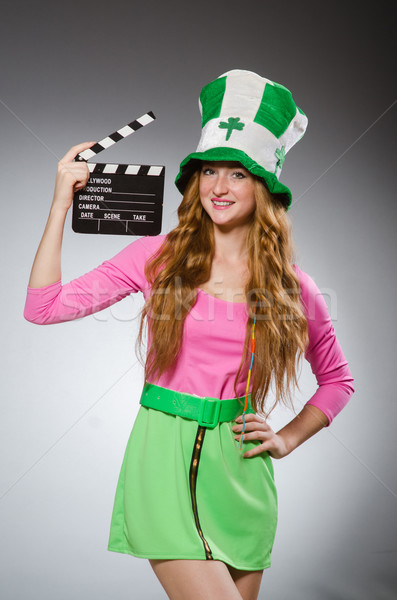 Woman with movie board in saint patrick concept Stock photo © Elnur