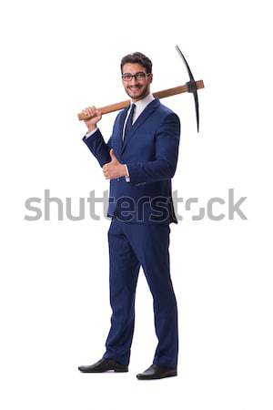 Young businessman holding a tool isolated on white Stock photo © Elnur