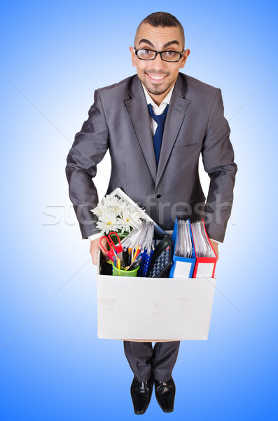 Man being fired with box of personal stuff Stock photo © Elnur
