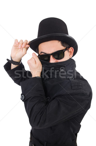 Young detective in black coat isolated on white Stock photo © Elnur