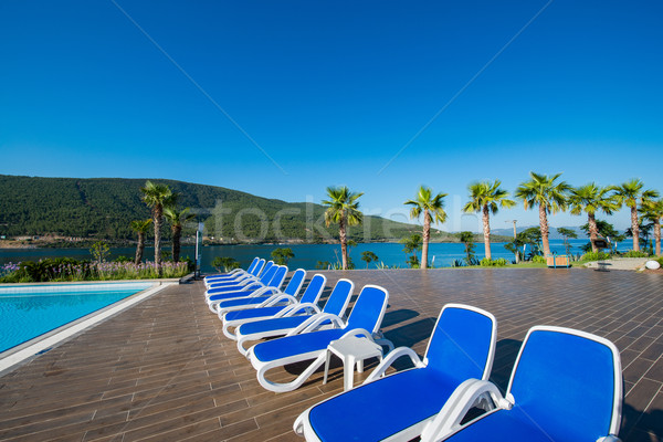 Stock photo: Nice swimming pool outdoors on bright summer day