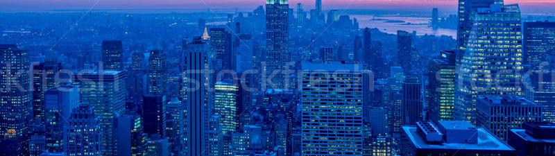 Kilátás új Manhattan naplemente üzlet égbolt Stock fotó © Elnur