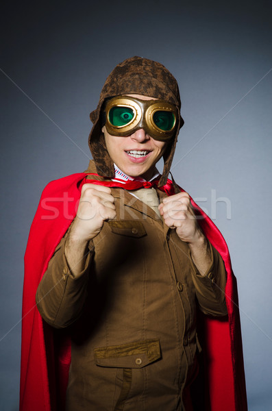 Funny pilot with goggles and helmet Stock photo © Elnur