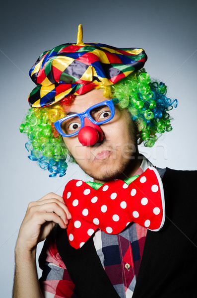 Funny clown against the dark background Stock photo © Elnur