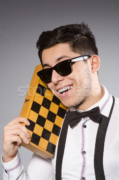 Funny chess player with board Stock photo © Elnur