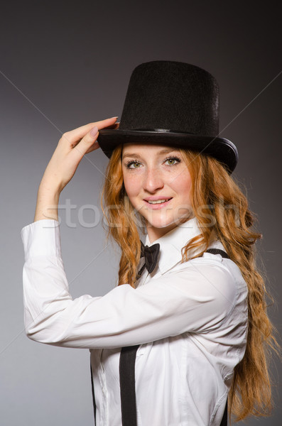 Red hair girl in classic style against gray Stock photo © Elnur