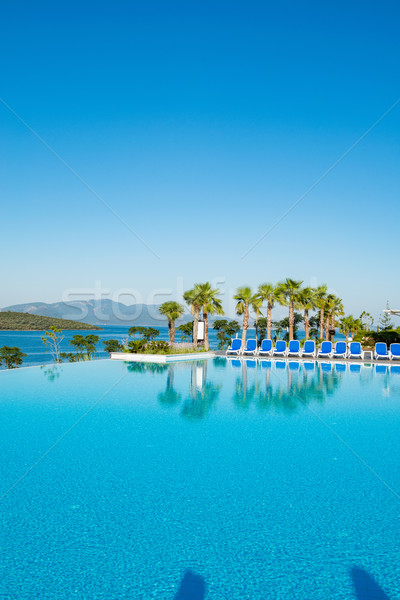 Nice swimming pool outdoors on bright summer day Stock photo © Elnur
