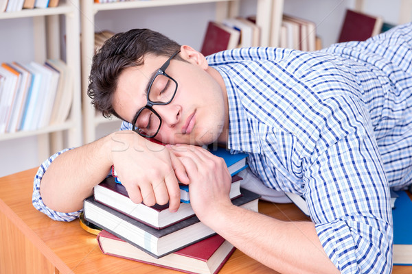 Stock photo: Young student taking break and falling asleep