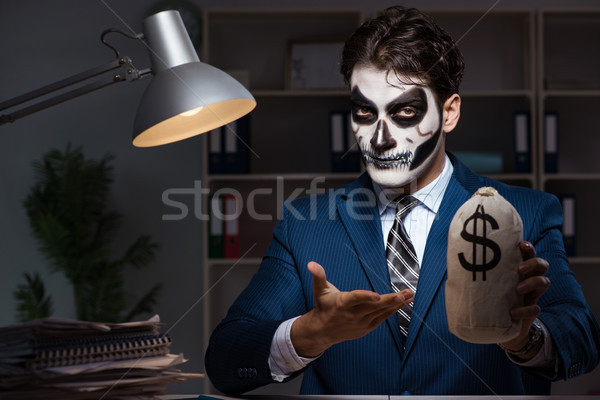 Stockfoto: Zakenman · scary · gezicht · masker · werken · laat
