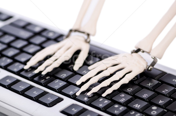 Skeleton working on the keyboard Stock photo © Elnur