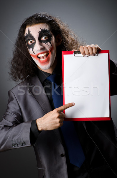 Funny Joker with paper binder Stock photo © Elnur
