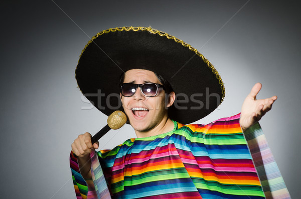 Funny mexicano cantando karaoke feliz micrófono Foto stock © Elnur