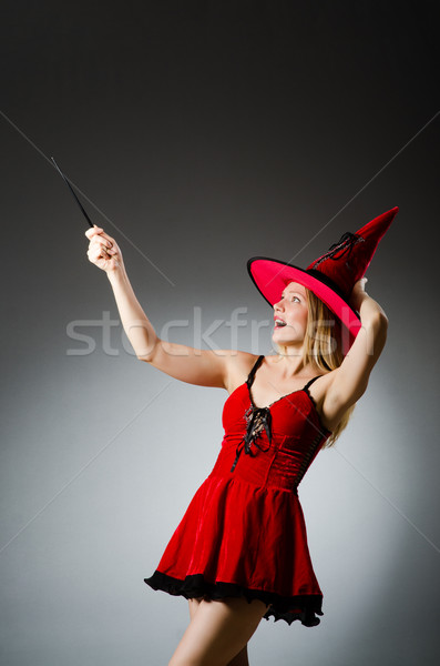 Woman magician doing her tricks with wand Stock photo © Elnur