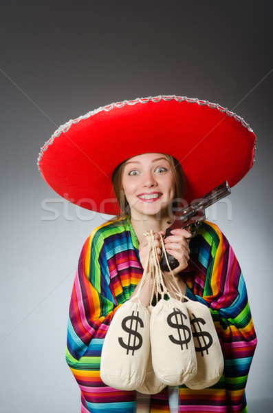 Lány mexikói tart kézifegyver pénz üzlet Stock fotó © Elnur