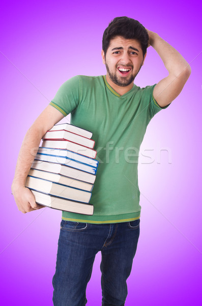 Student with lots of books on white Stock photo © Elnur