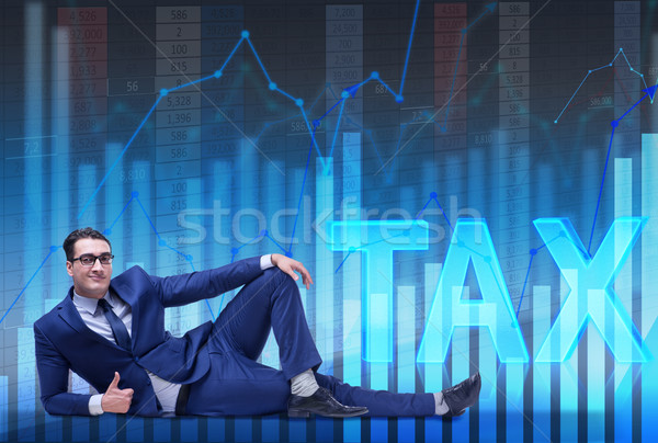 Businessman in tax burden business concept Stock photo © Elnur