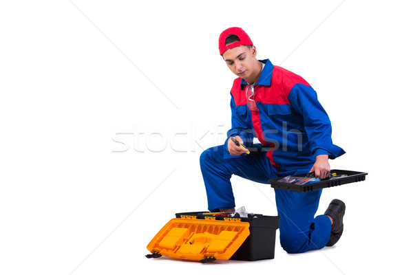 Young repairman with wrench spanner isolated on white Stock photo © Elnur
