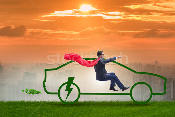 Stock photo: The electric car concept in green environment concept