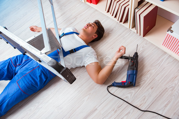 Stock photo: Unsafe behavior concept with falling worker