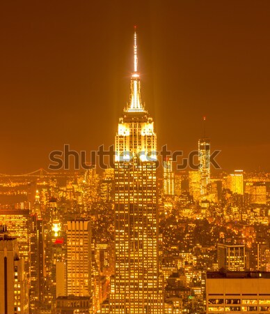 Kilátás New York Manhattan naplemente üzlet égbolt Stock fotó © Elnur