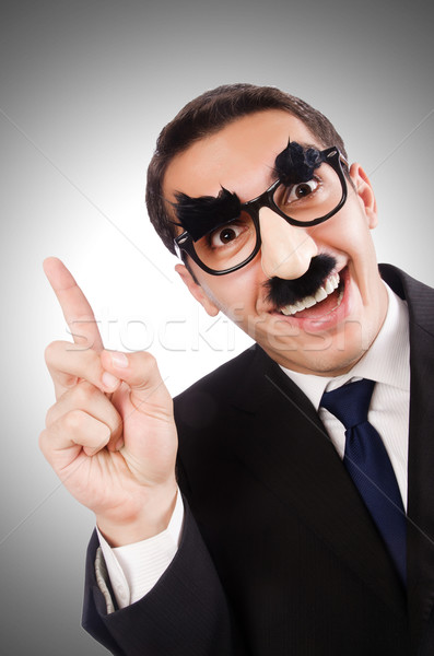 Funny businessman with eyebrows and moustache Stock photo © Elnur