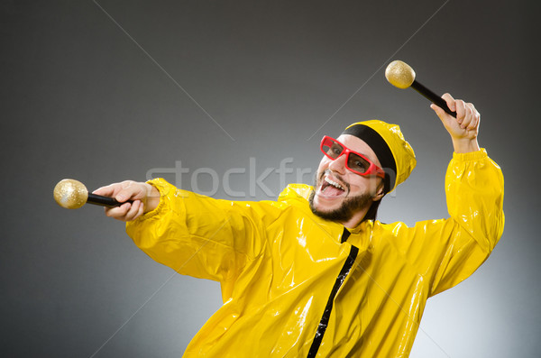 Férfi visel citromsárga öltöny buli tánc Stock fotó © Elnur
