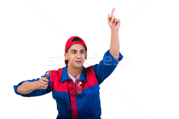 Young repairman with wrench spanner isolated on white Stock photo © Elnur