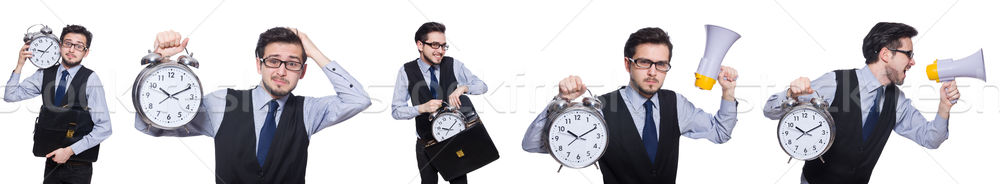 Young businessman holding alarm clock isolated on white Stock photo © Elnur