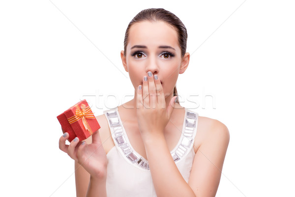 Young woman with giftbox isolated on white background Stock photo © Elnur