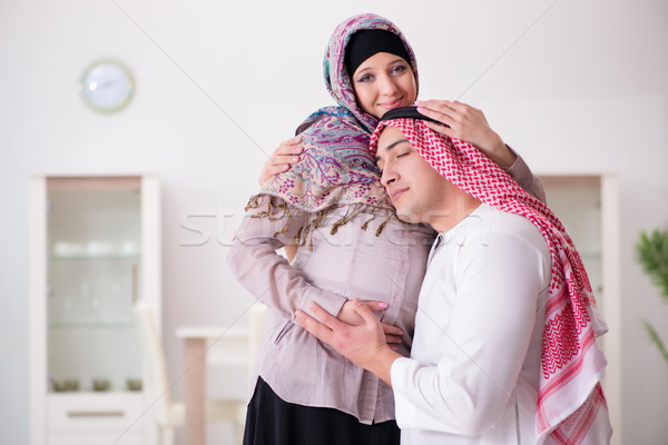 Young arab muslim family with pregnant wife expecting baby Stock photo © Elnur