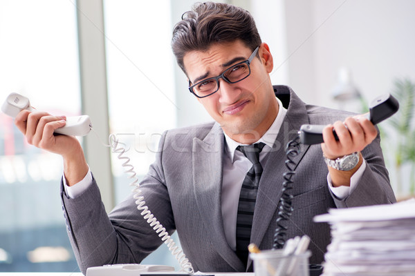 Stock photo: Angry helpdesk operator yelling in office