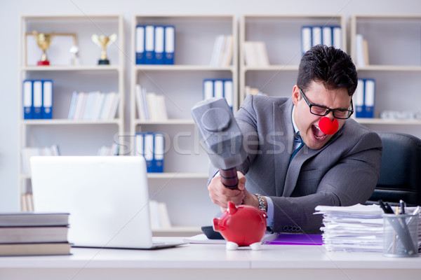 Clown affaires tirelire marteau argent homme [[stock_photo]] © Elnur