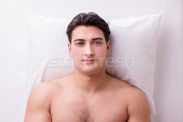 Handsome man in spa massage concept Stock photo © Elnur